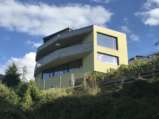 Villa familiale en béton apparent à Bramois